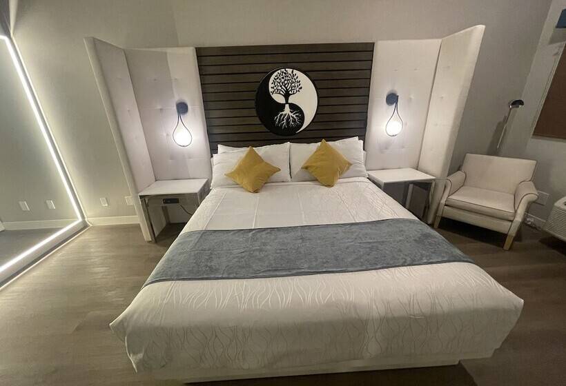 Отель Aspire Inn Studios & Spas