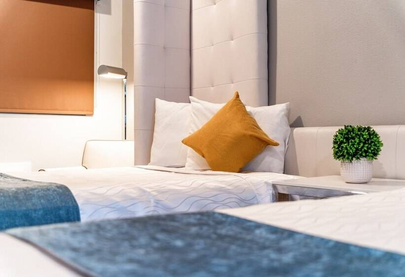 Отель Aspire Inn Studios & Spas