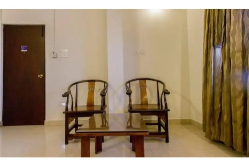 Blossoms Hotel & Service Apartments