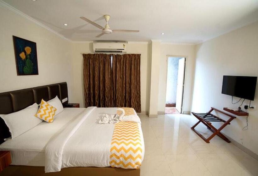 Blossoms Hotel & Service Apartments