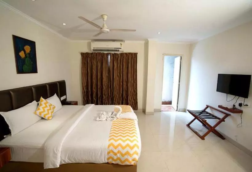 Blossoms Hotel & Service Apartments