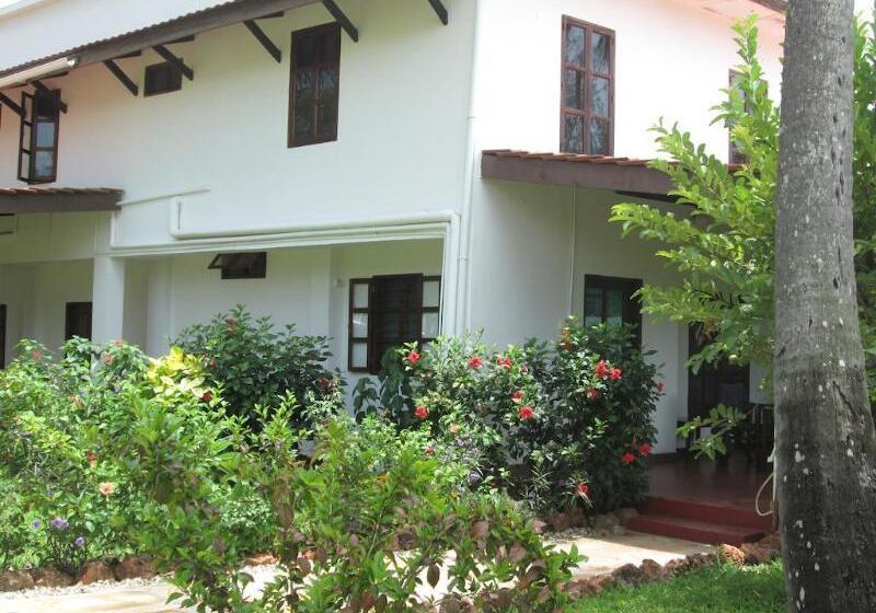 فندق Flame Tree Cottages