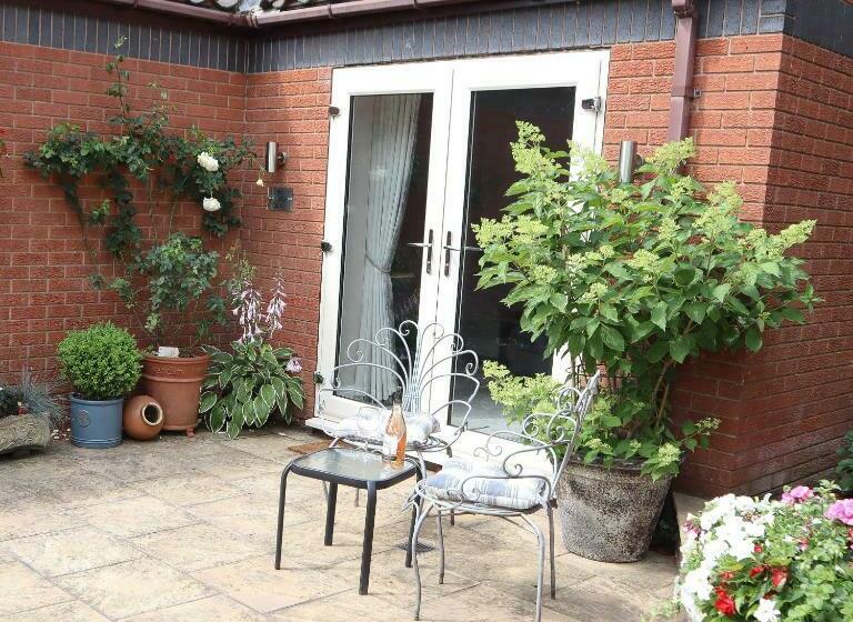 פנסיון The Gardens Room