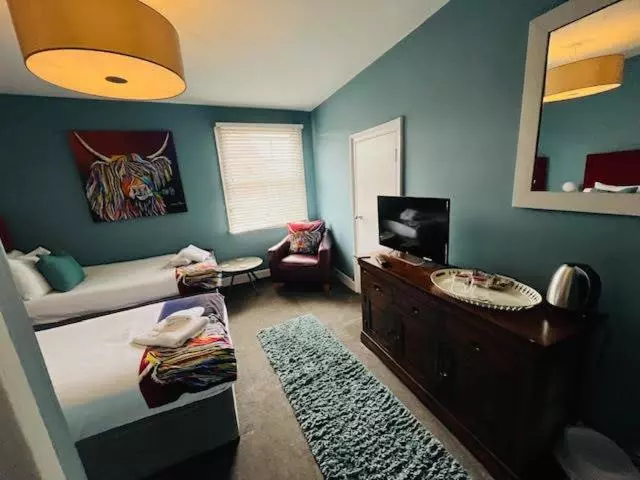 Hotelli Horn And Trumpet