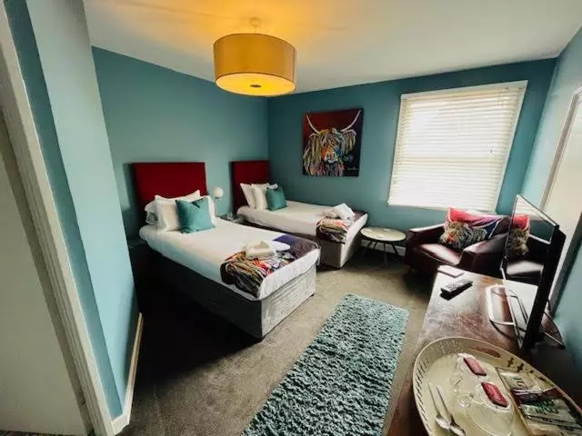 Hotelli Horn And Trumpet