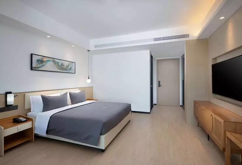 ホテル Ramada Encore By Wyndham Jiusuo Downtown