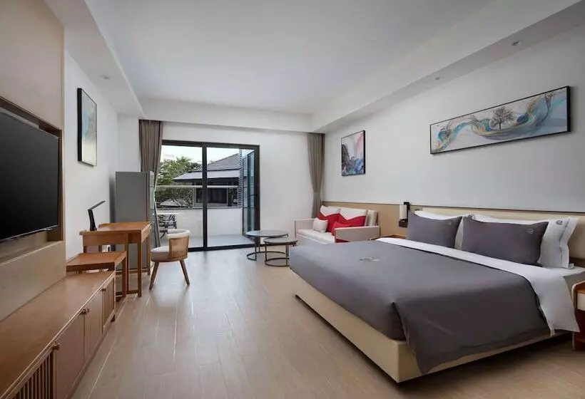 ホテル Ramada Encore By Wyndham Jiusuo Downtown