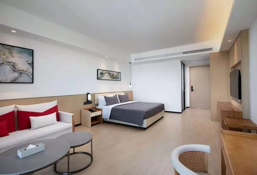 ホテル Ramada Encore By Wyndham Jiusuo Downtown