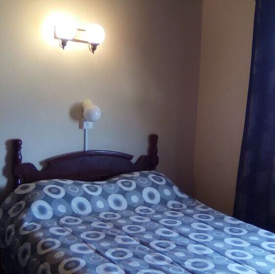 هتل Shonlan Inn And Apartments