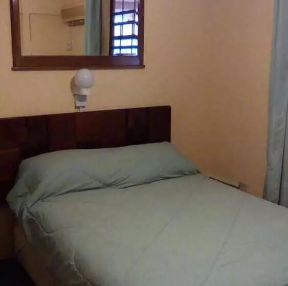 هتل Shonlan Inn And Apartments