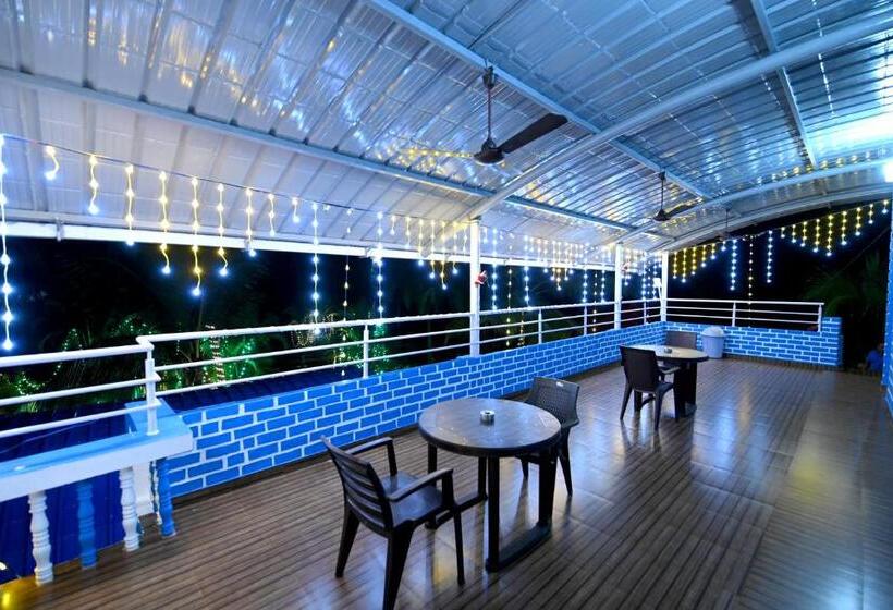 פנסיון His Grace Holiday Homes Nr To Malpe Beach