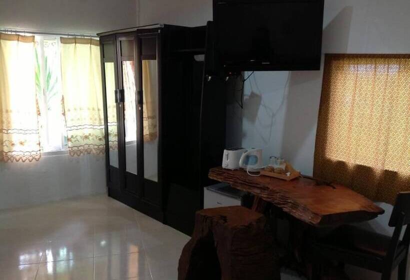 בית מלון כפרי Ruan Mai Naiyang Beach Resort