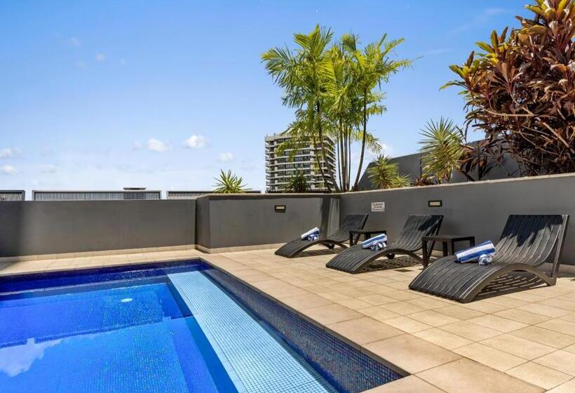 H On Mitchell Apartment