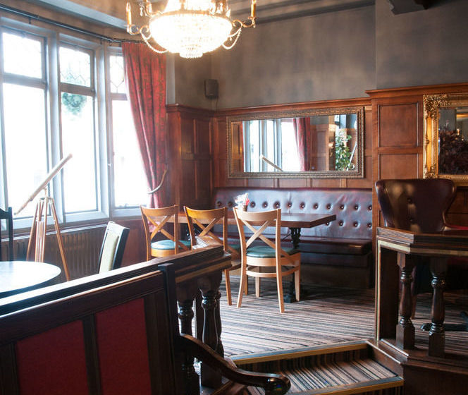 Отель Huckleberrys Bar And Grill