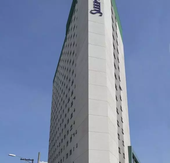 Отель Sleep Inn Praia Do Canto