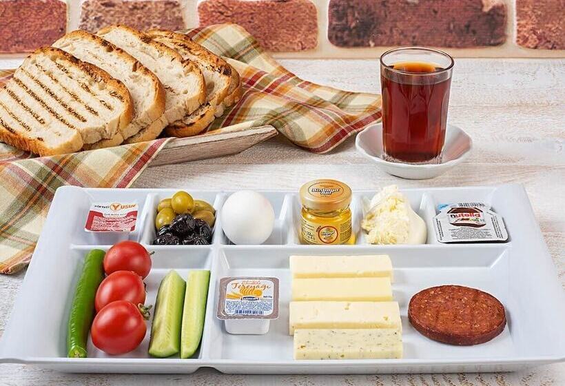 فندق Güner City