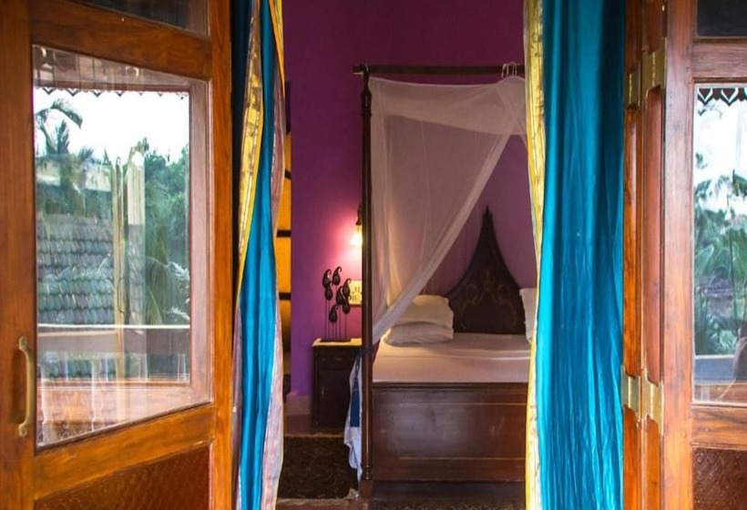 Hotel Papa Jolly Eco Resort Near Morjim Beach