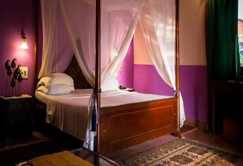 Hotel Papa Jolly Eco Resort Near Morjim Beach