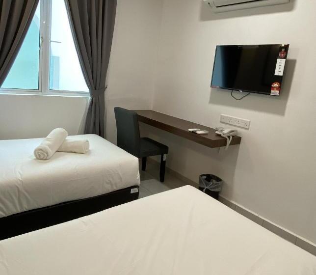 هتل Cafe & Capital O 90756 Cara Hulu