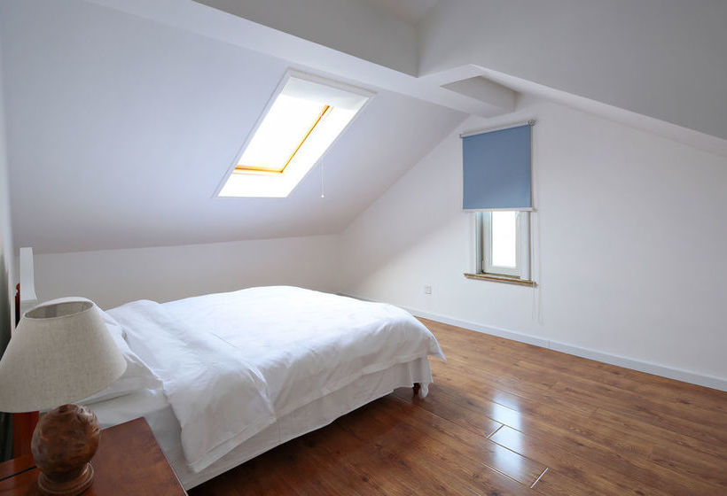 Отель Qingdao Oceanside & Resort