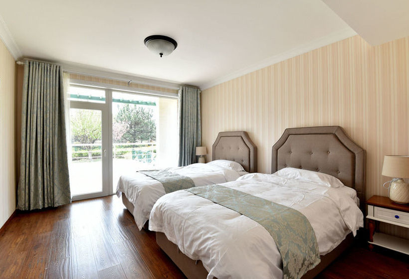 Отель Qingdao Oceanside & Resort