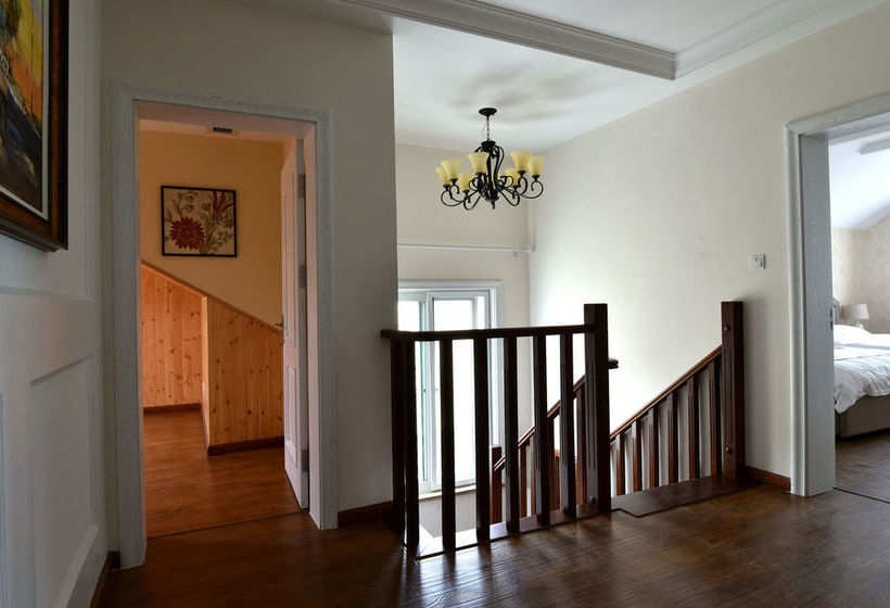 Отель Qingdao Oceanside & Resort