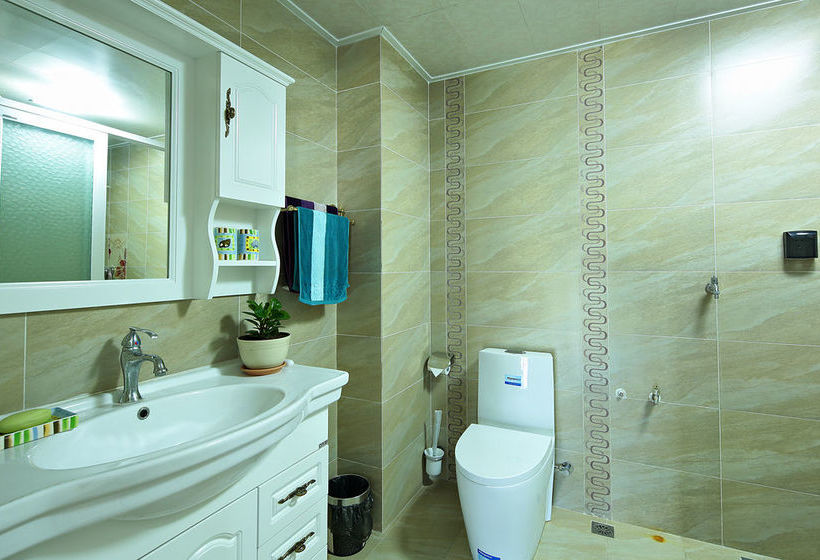 Отель Qingdao Oceanside & Resort