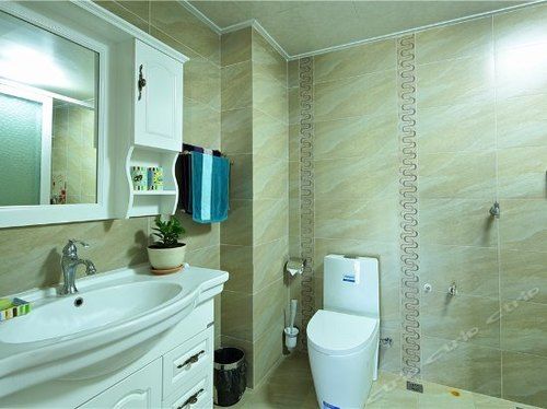 Отель Qingdao Oceanside & Resort