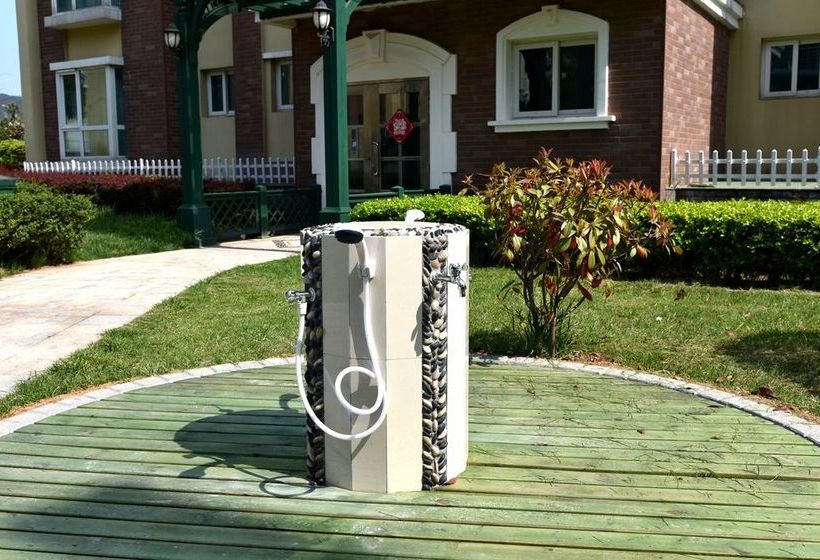 Отель Qingdao Oceanside & Resort