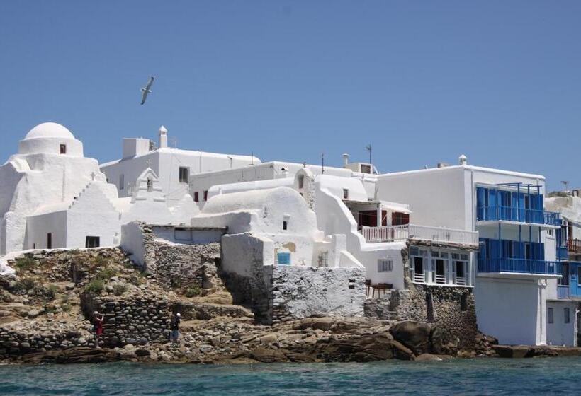 Отель Bluetopia Suites