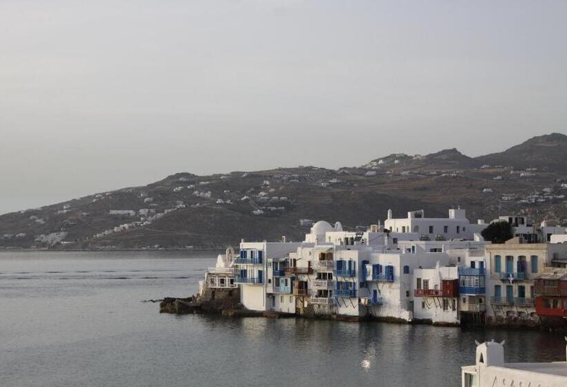 Отель Bluetopia Suites