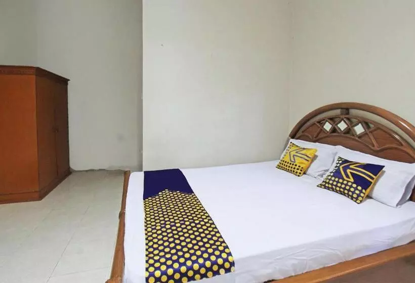 ホテル Spot On 92973 Madani Syariah Guesthouse