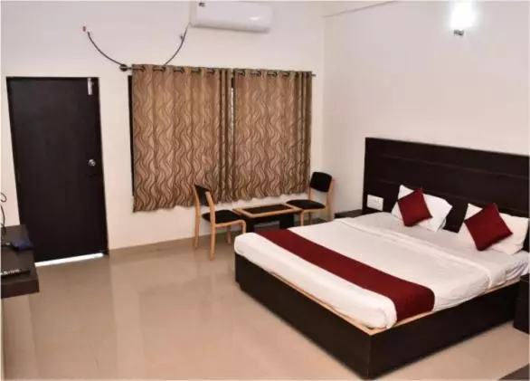 ホテル Nijaguna Residency