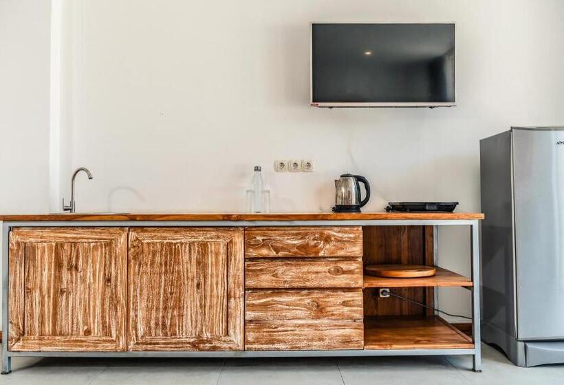 Отель Komodo Suites Downtown Managed By Cpm Bali