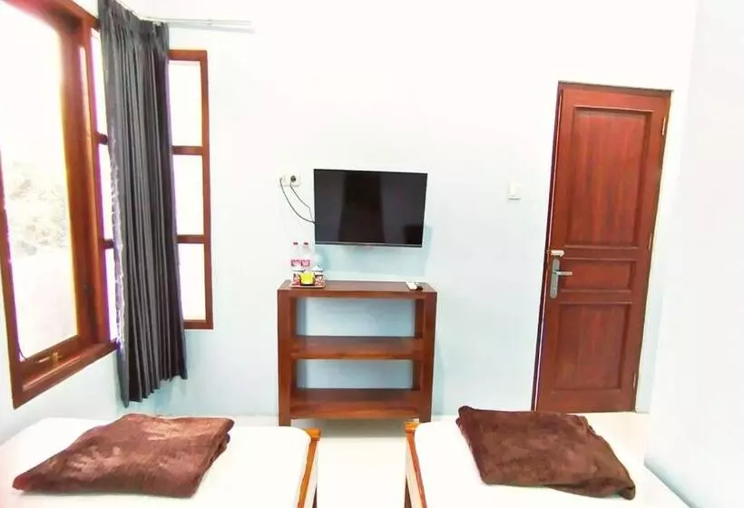 ホテル Wisma Kencana Syariah Near Uns Mitra Reddoorz