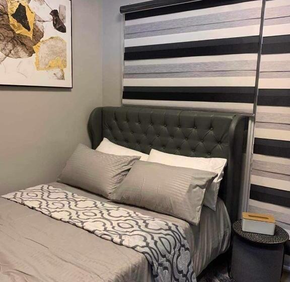 Отель Four Angels Staycation In Trees Residences Near Sm Fairview