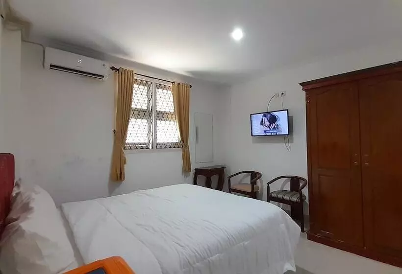 Hotelli Oyo 93402 Family Homestay Syariah