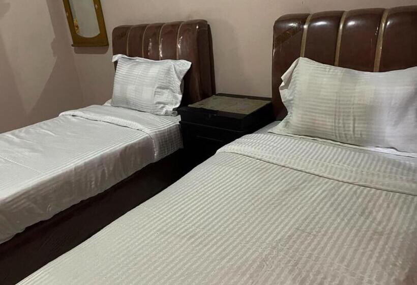 Hotel Oyo 93292 Raudhatul Husna Homestay Syariah