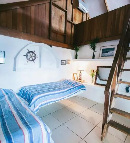 ホテル Oceanfront Bungalows   Paradise Rentals