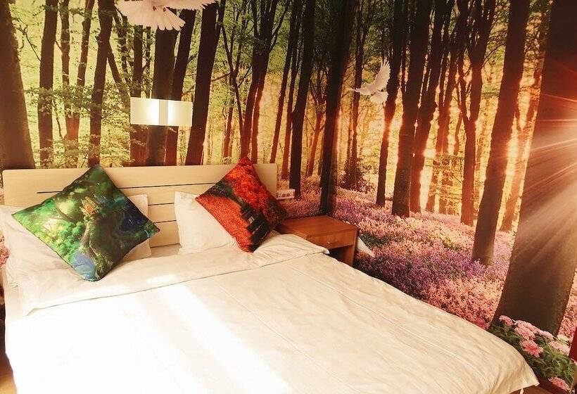 Отель Dalian Venus Apartment