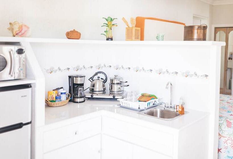 تختخواب و صبحانه Coconut Palm Hideaway