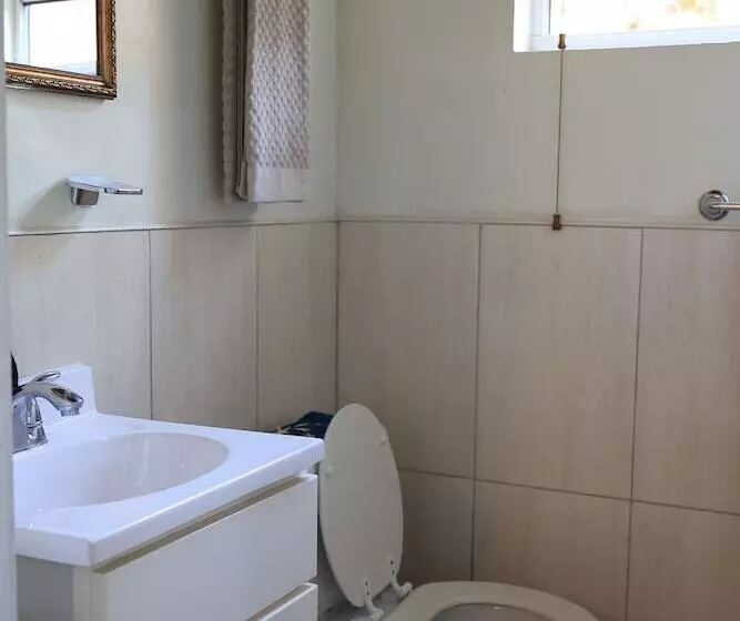 تختخواب و صبحانه Coconut Palm Hideaway