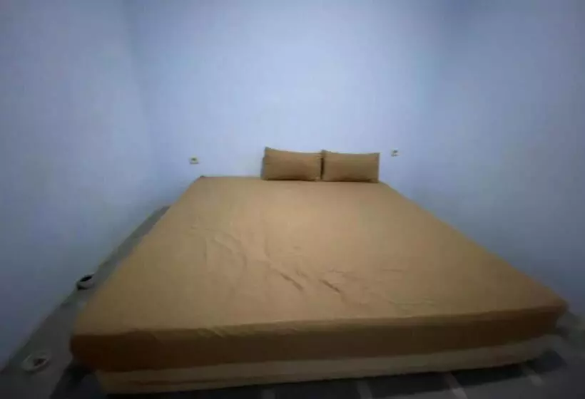 ホテル Spot On 93510 Penginapan Melati Tanjung