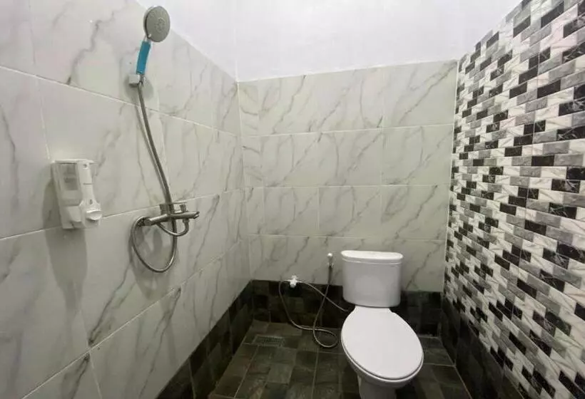 ホテル Spot On 93510 Penginapan Melati Tanjung