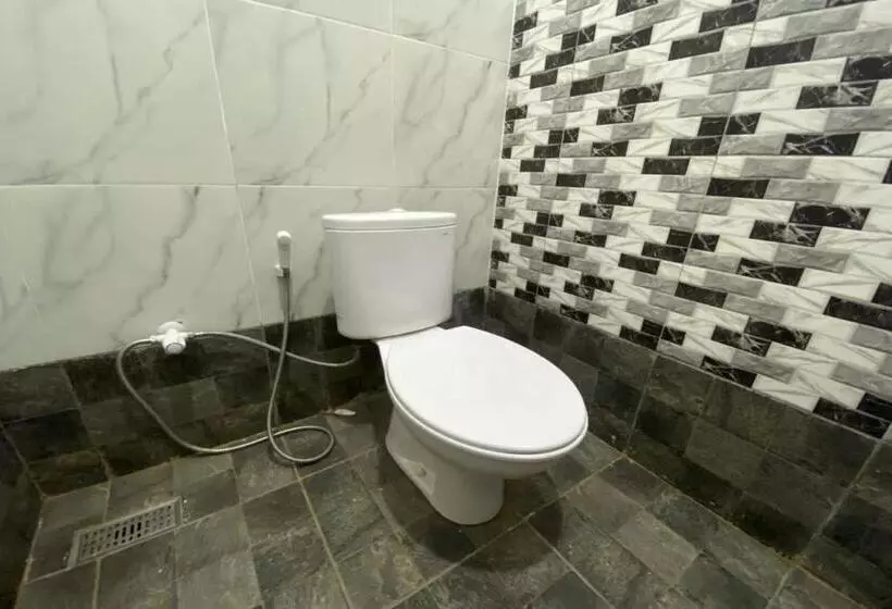 ホテル Spot On 93510 Penginapan Melati Tanjung