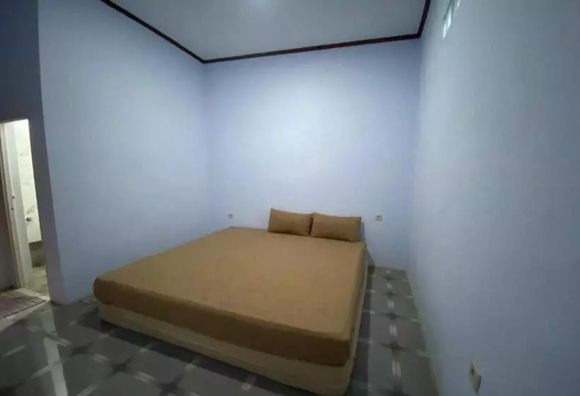 ホテル Spot On 93510 Penginapan Melati Tanjung