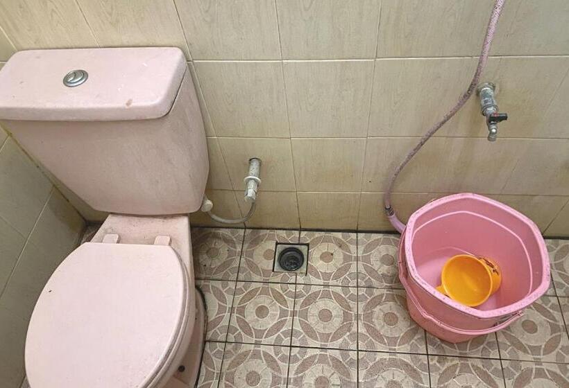 Отель Spot On 93517 De Lanang Homestay