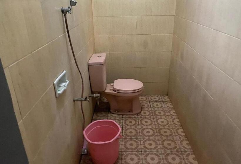 Отель Spot On 93517 De Lanang Homestay