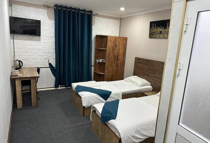 هتل Ilhombek Guest House