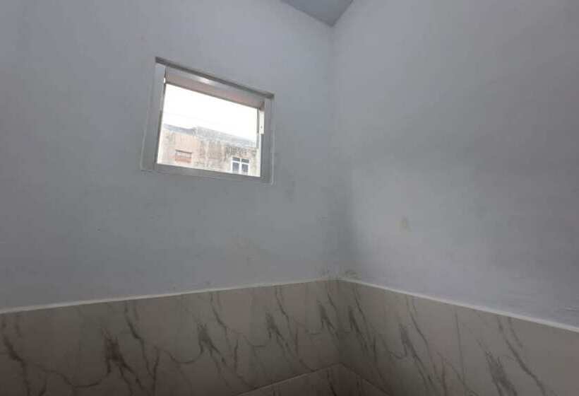 Otel Spot On 93464 Penginapan Tulimario Syariah